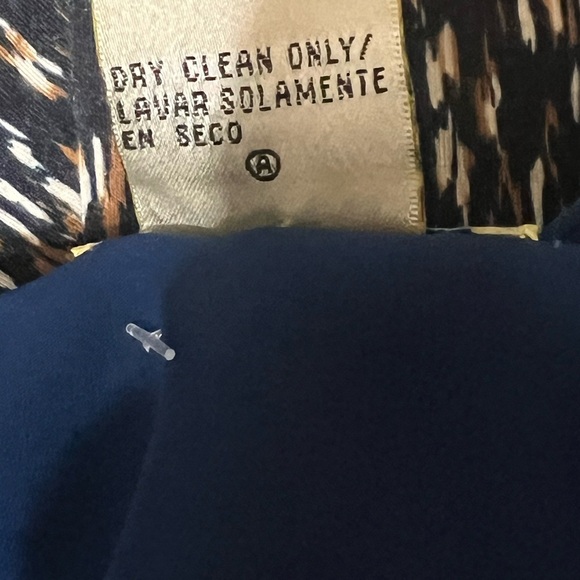 Ice Blue Silk Ruffled Blouse with V-Neckline and Bell Sleeves - Picture 5 of 5